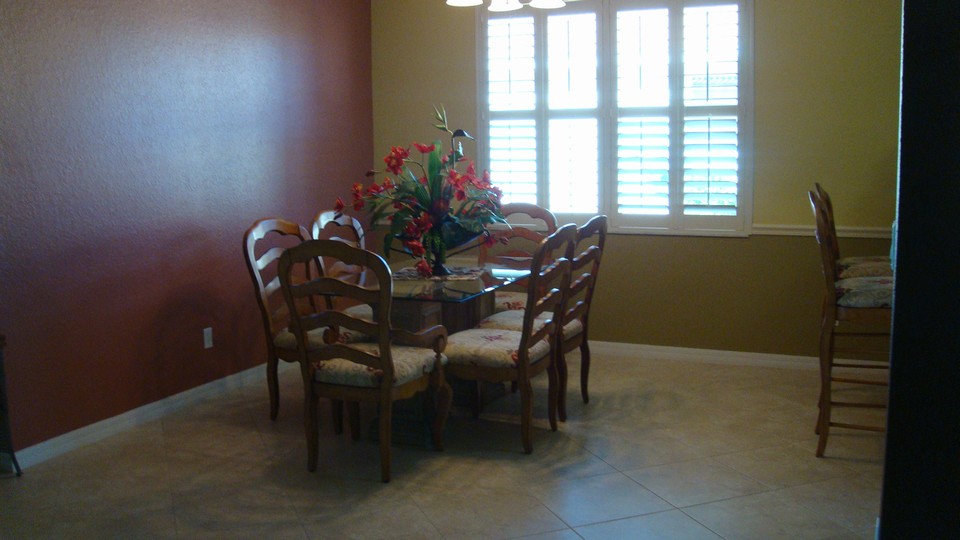 dining room with  glass top table & 6 chairs