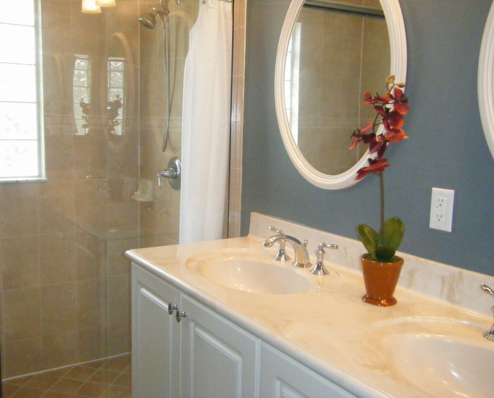 master bath, separate shower, his & her sinks with raised counters