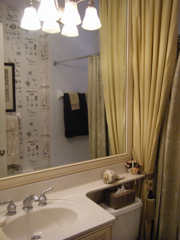 guest bath, framed mirror to ceiling, full tile to ceiling in tub/shower