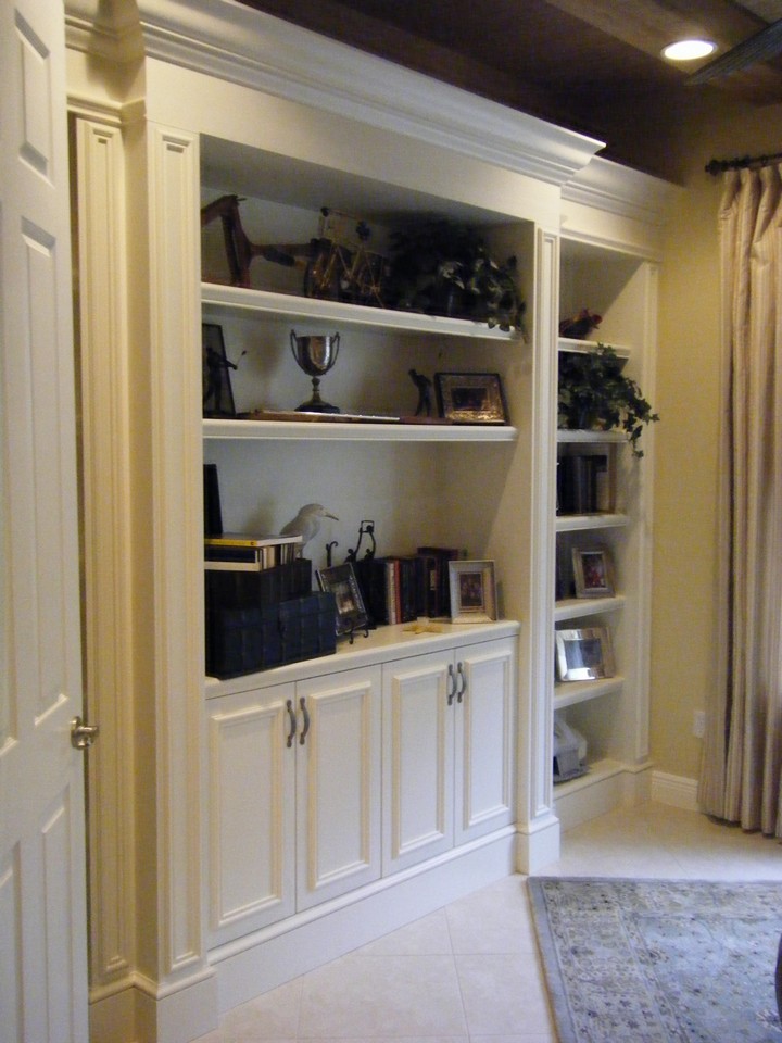 custom built in wall unit in den