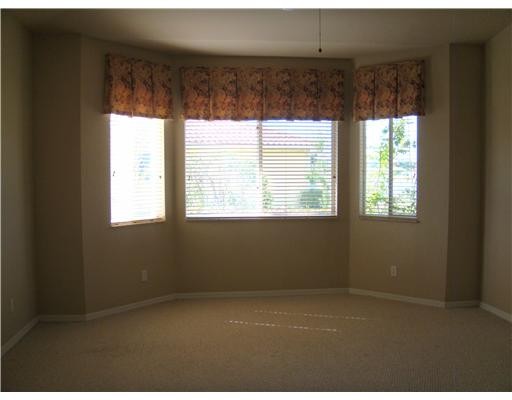 master bedroom with bay window