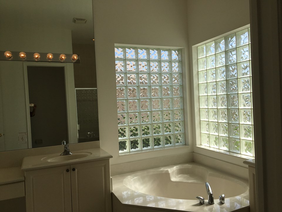 master bathroom, his/her sinks, soak tub and separate shower