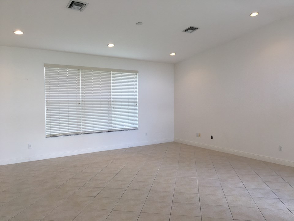 family room, vaulted ceiling and hi-hats