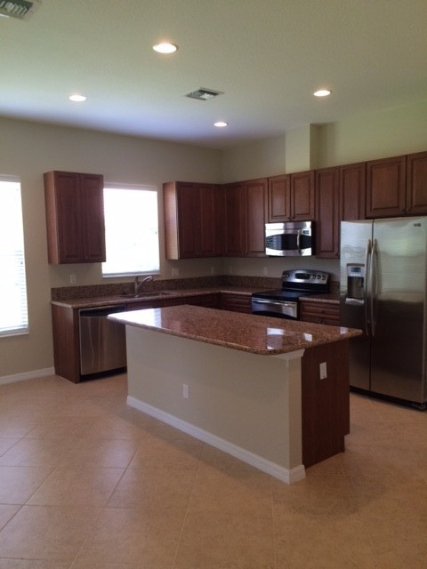 granite counters, cherry cabinets, ss appliances