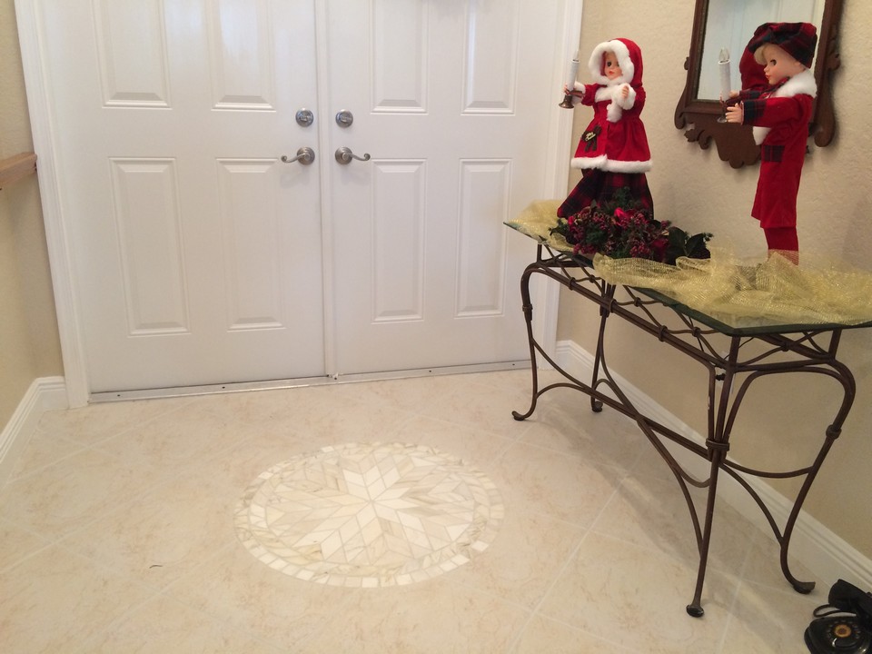 raised foyer with tile  in-lay