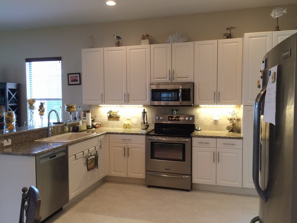 plenty of cabinets in kitchen