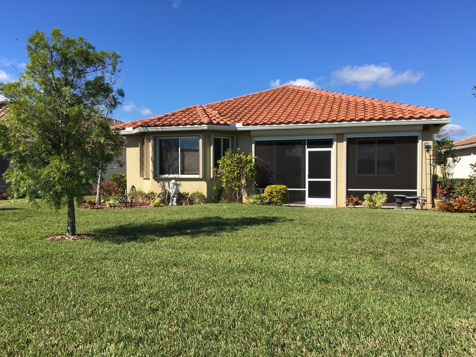 back view of house with screened patio