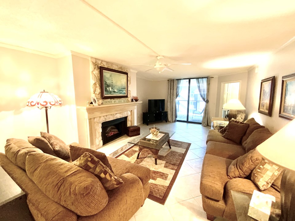 living room with decorative fireplace