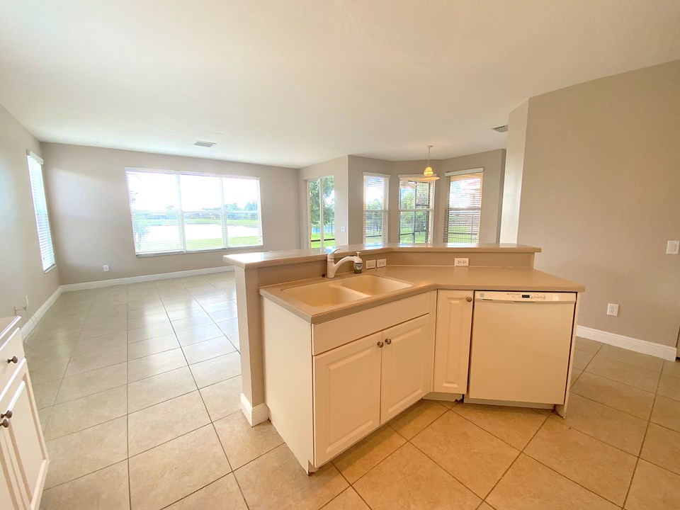 view from kitchen to family room and cafe