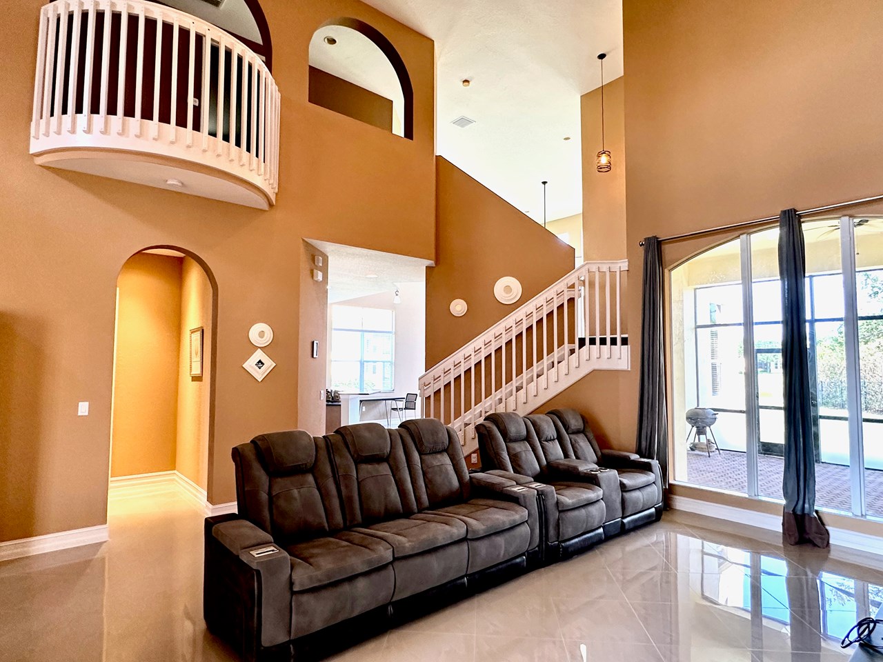 living room with tall windows