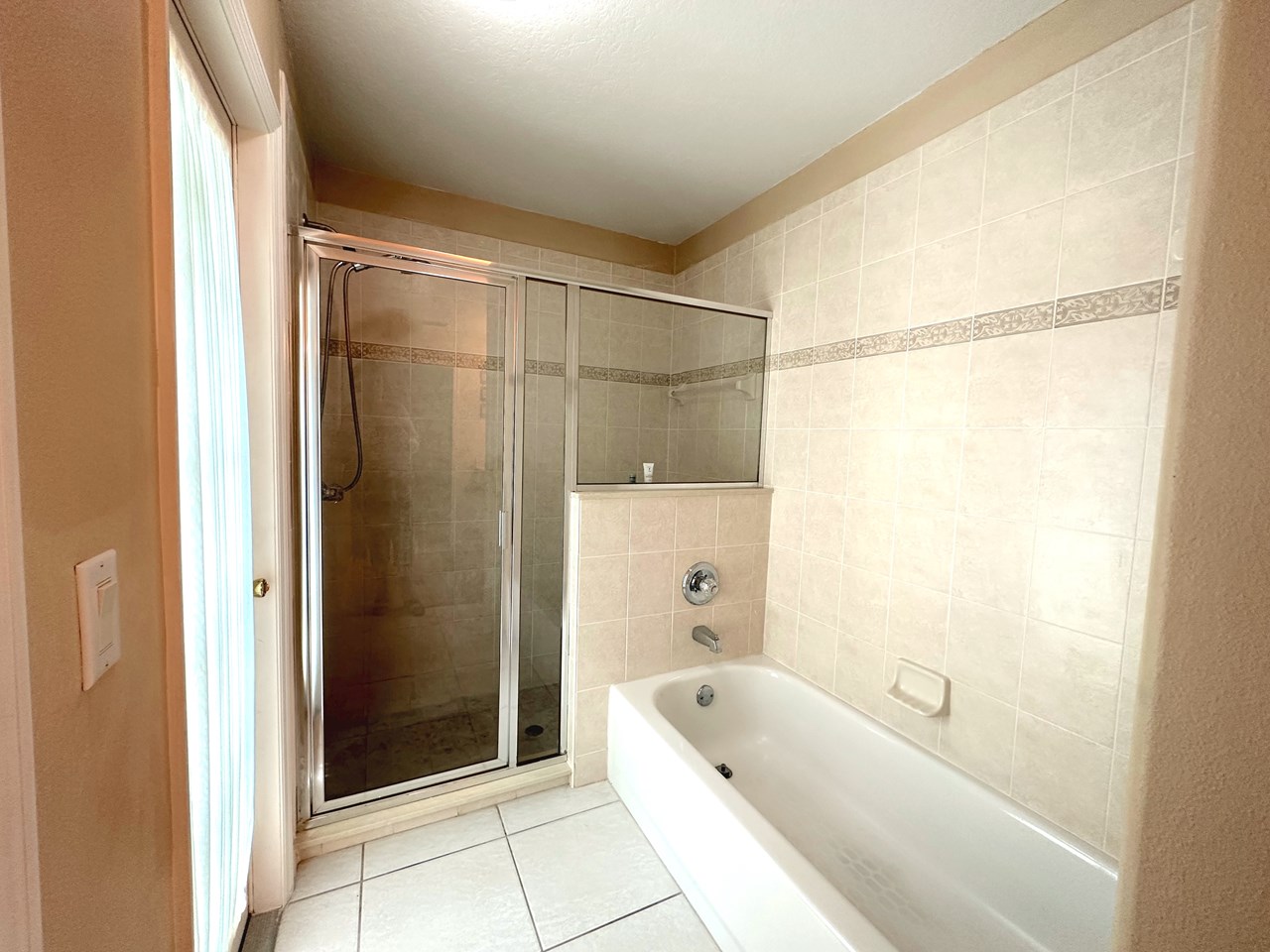 primary bath with shower & tub