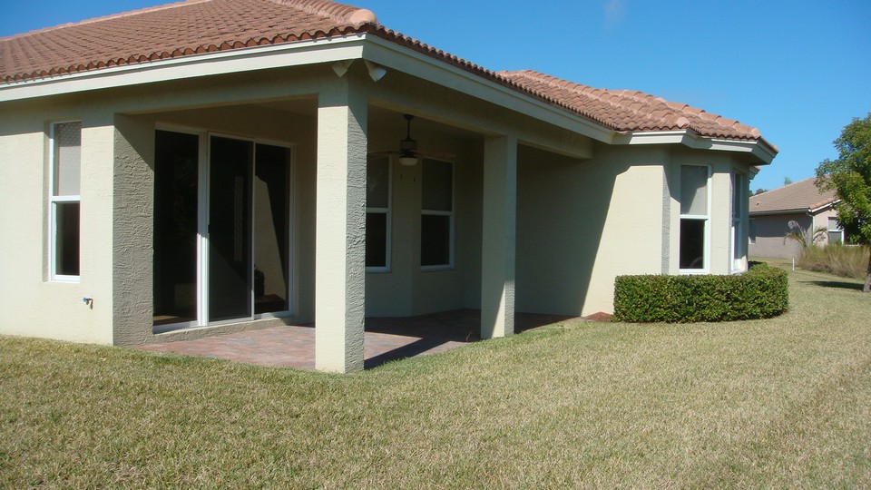 covered patio, sliders from family room