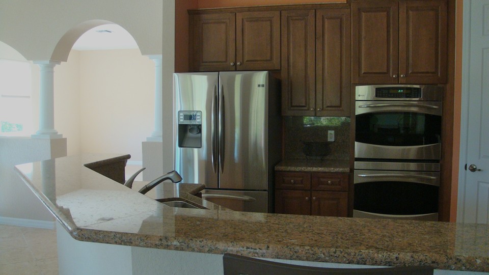 stainless appliances, double oven, granite with full back splash