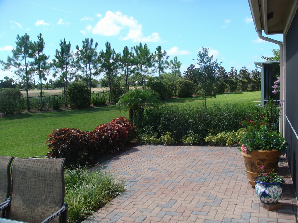 expaned patio with a view of private backyard