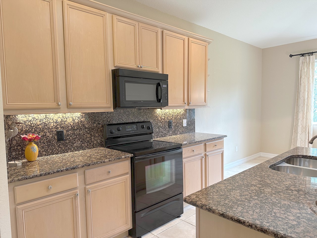 full granite backsplash/under-mount lighting