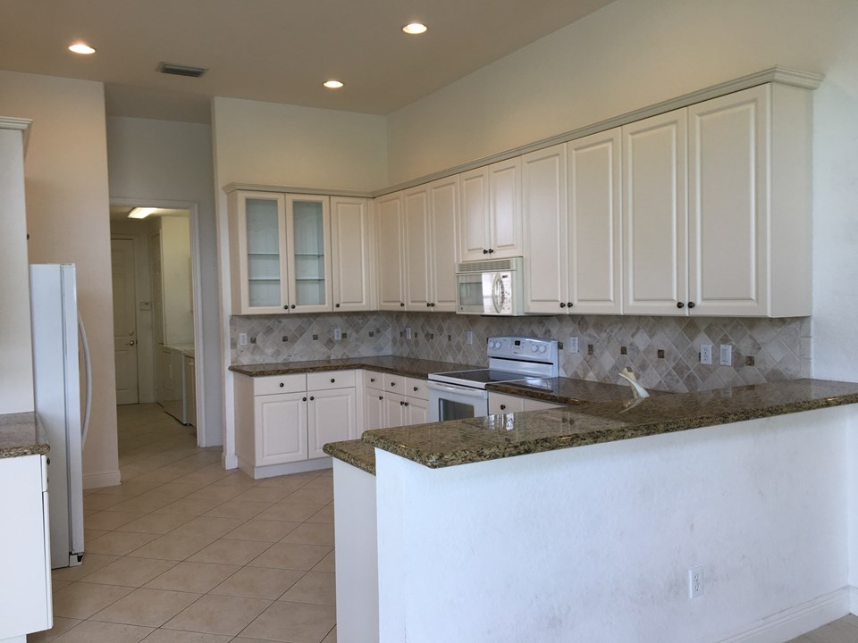full view of kitchen with snack counter