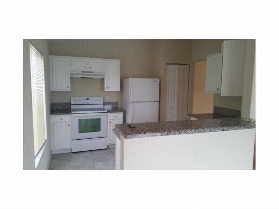 granite counters plus a snack counter in kitchen