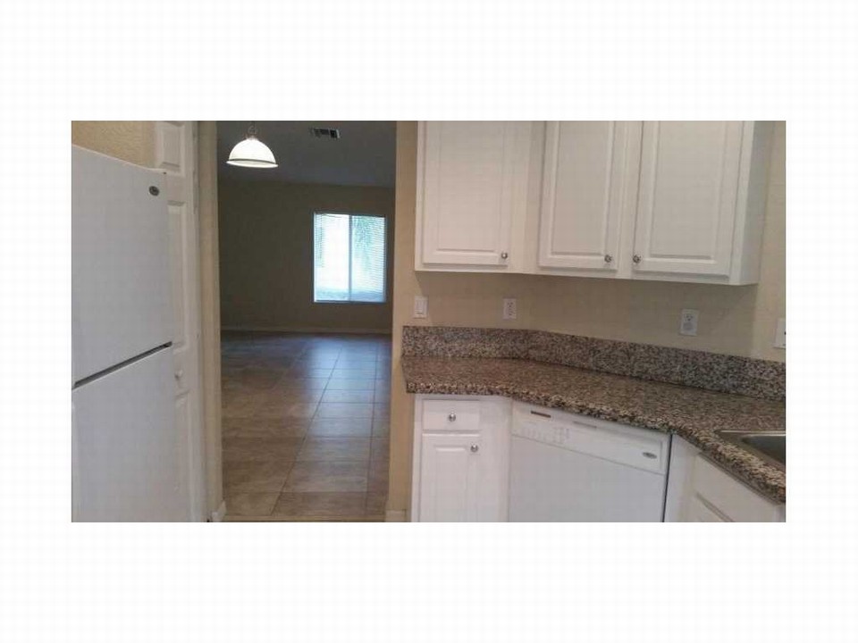 view from kitchen-doorway to living/dining room
