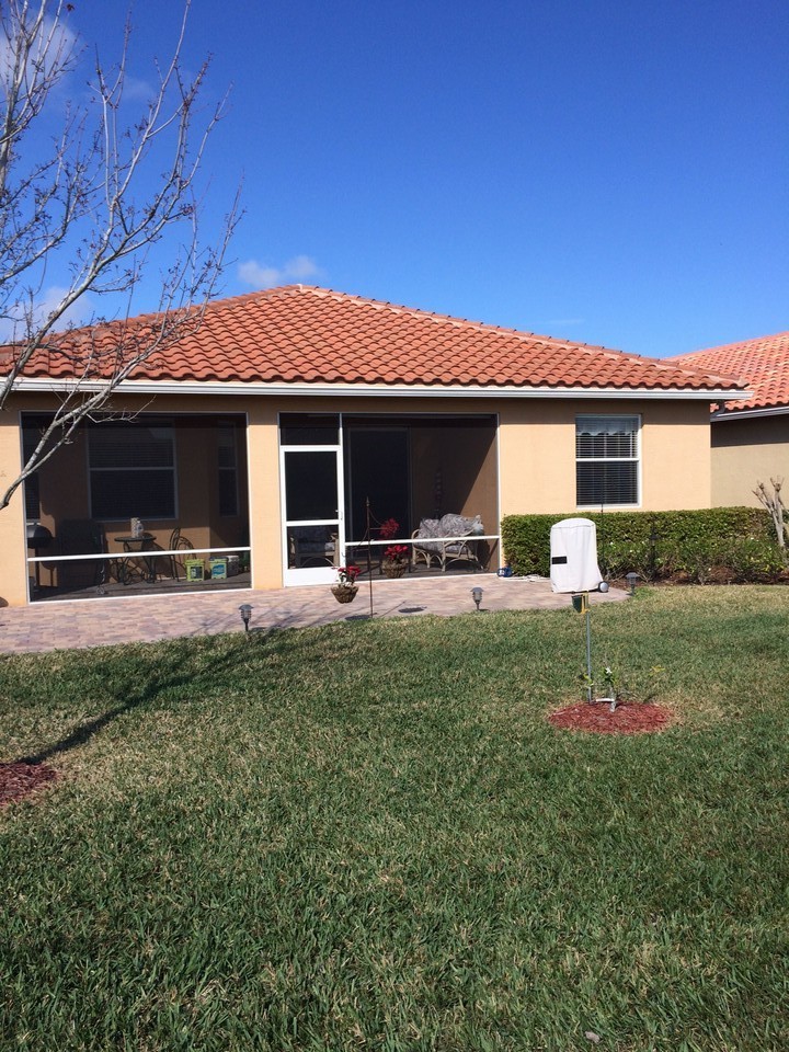 back view, screened covered patio and expanded patio