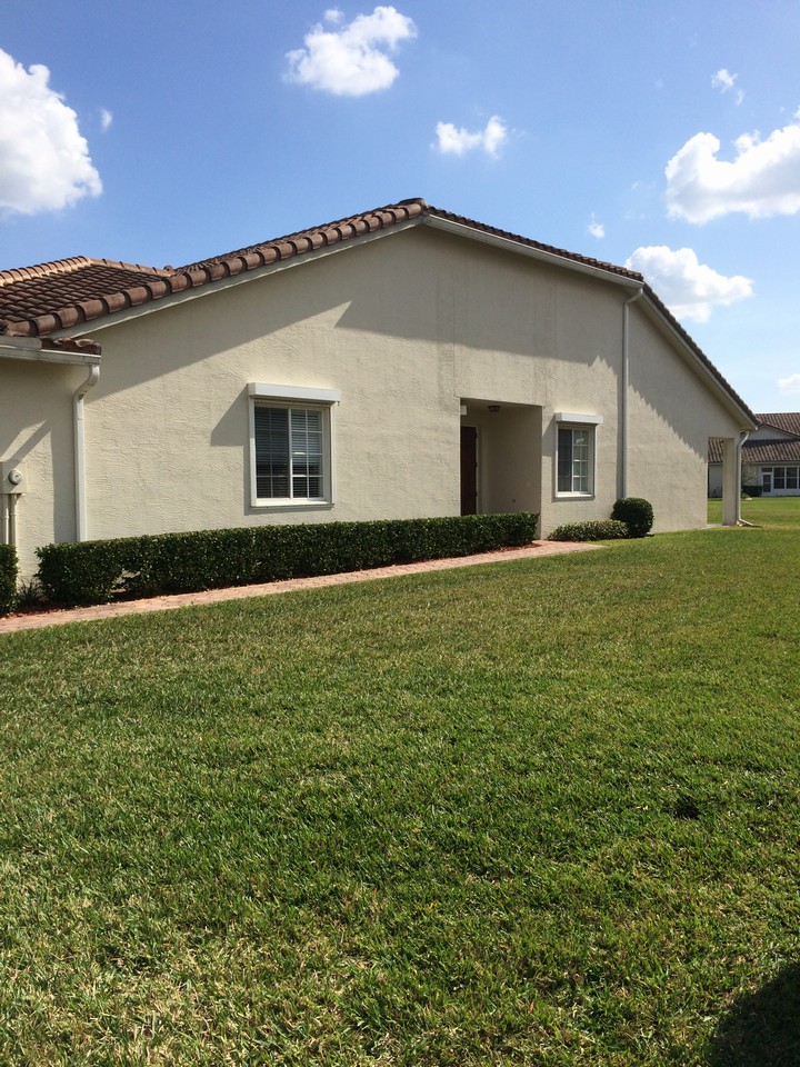 side entrance, roll down storm shutters