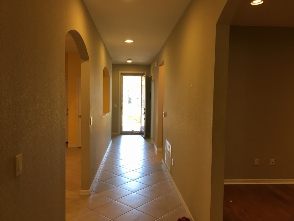foyer entrance with storm door