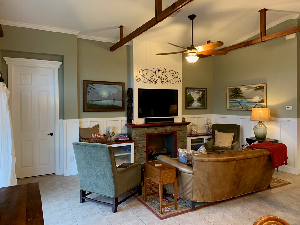 great room with wood beams