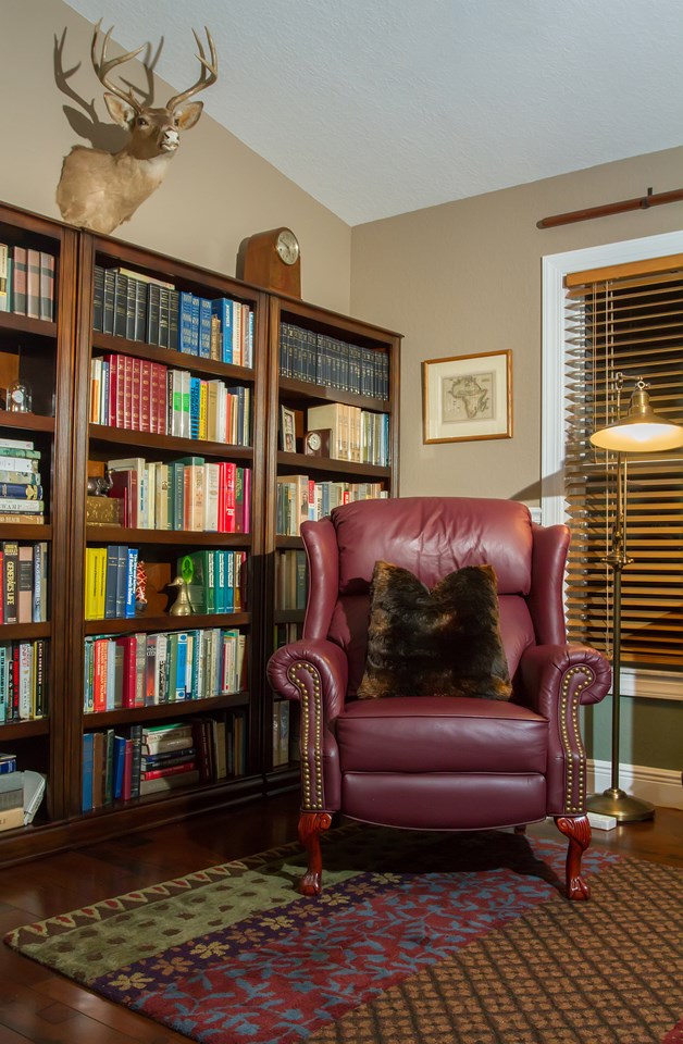 den/office with wood flooring
