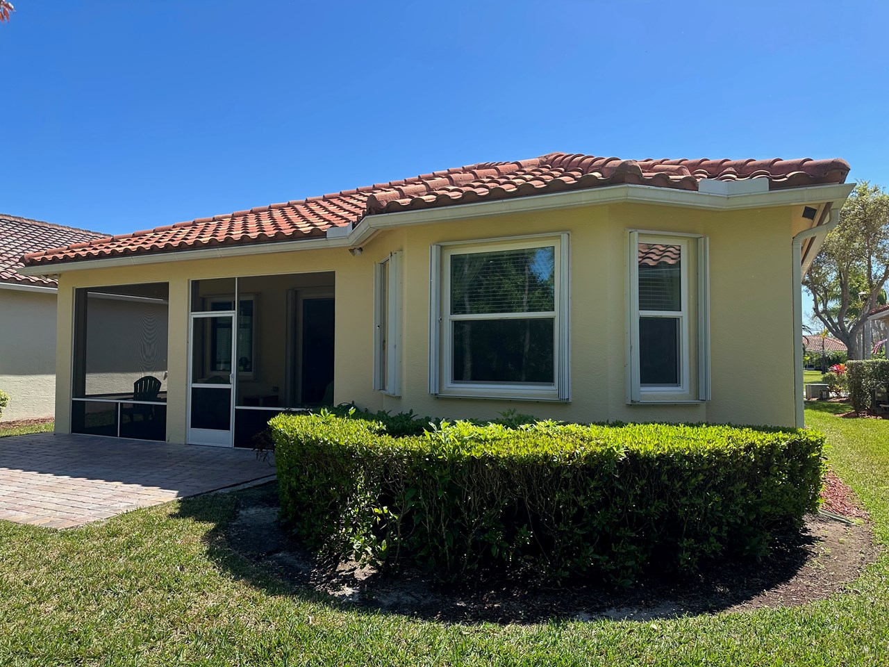 back view of house with extended patio