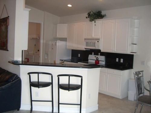 kitchen with: 42 upper cabients and snack counter