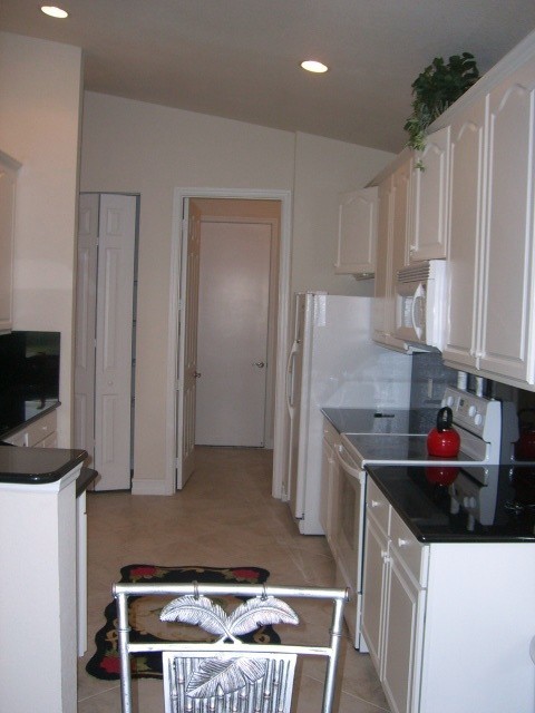 kitchen leading to utilty room