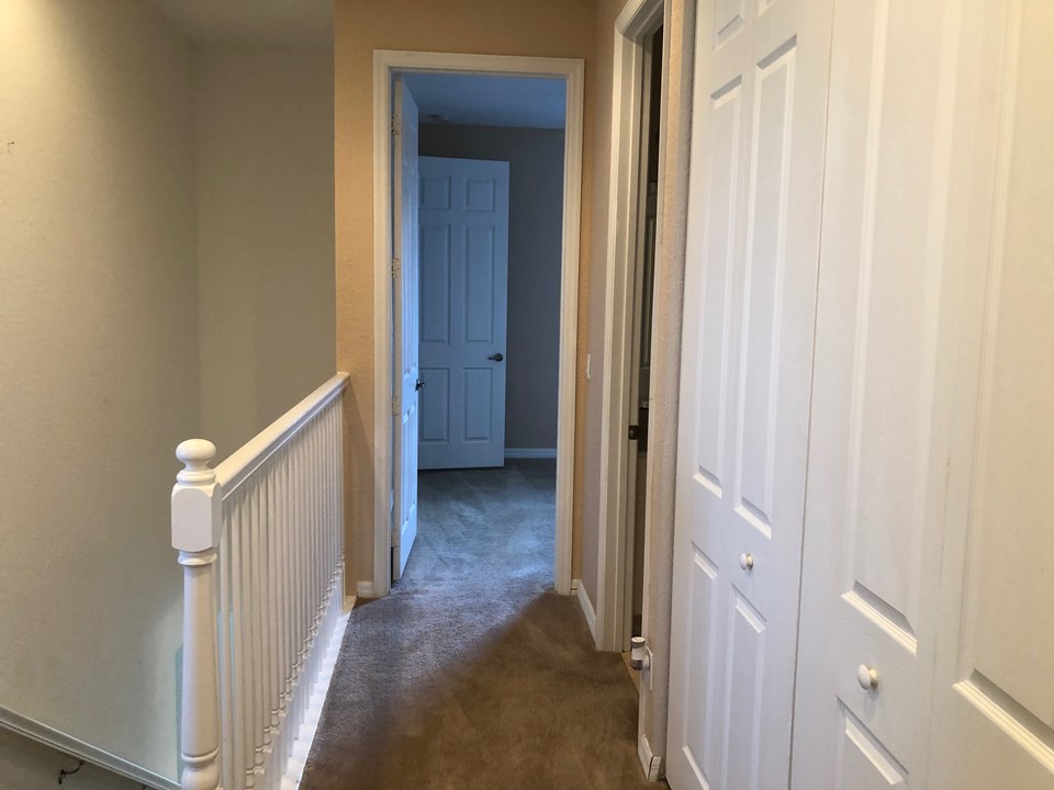 hallway with wood flooring