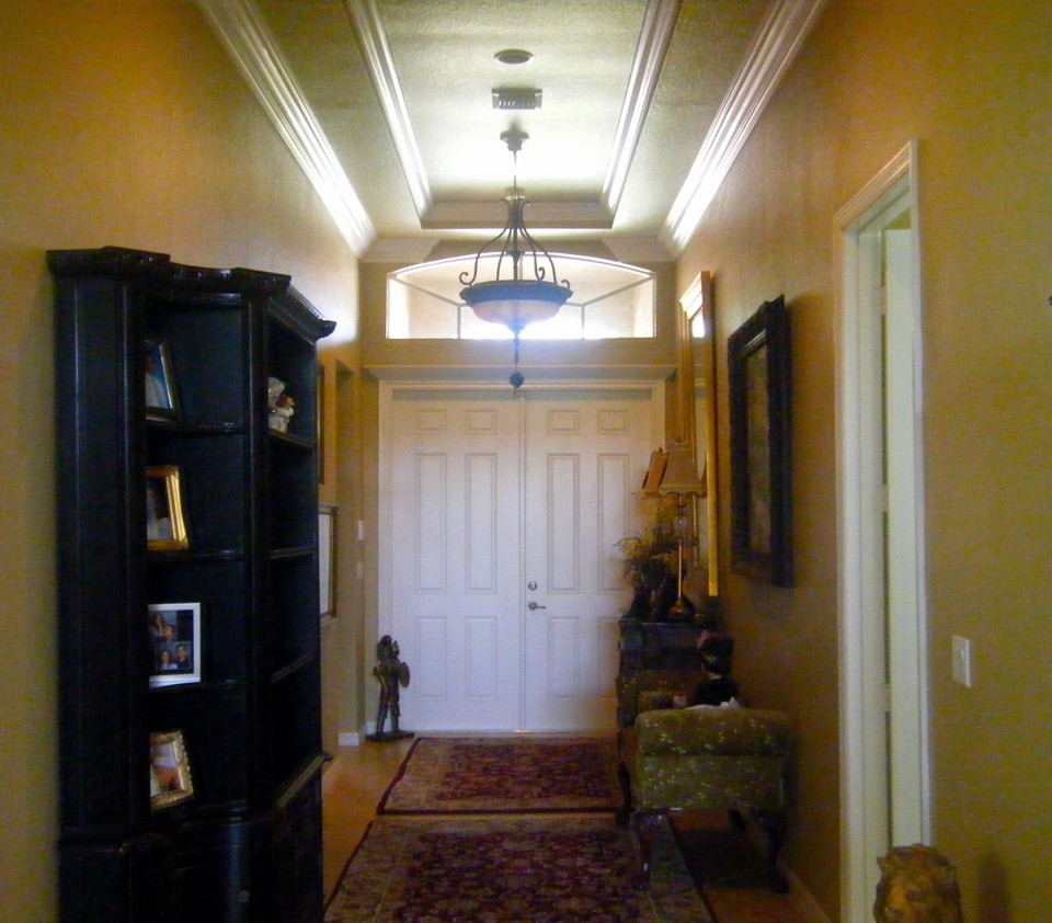 grand foyer entrance with double front doors & double tray ceiling