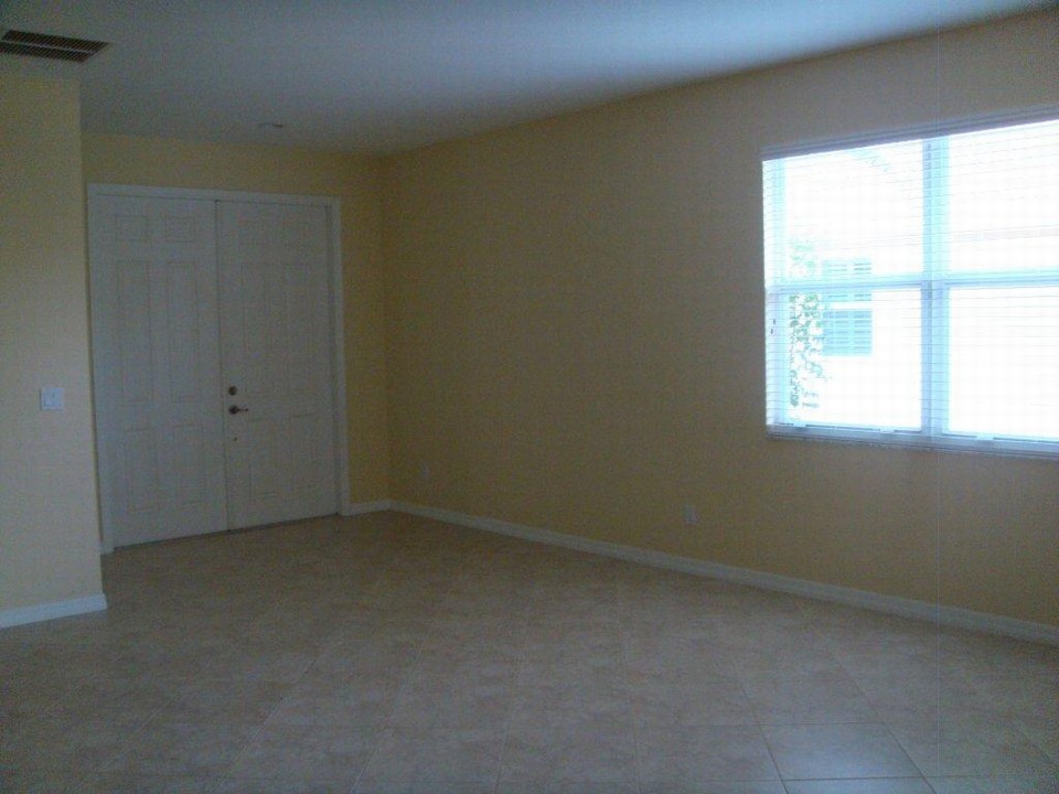 double door entry  leading to living room