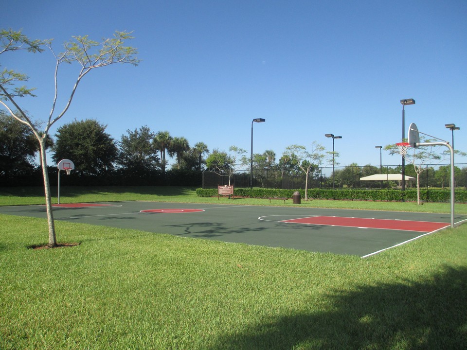 basketball court with 2 tennis courts behind