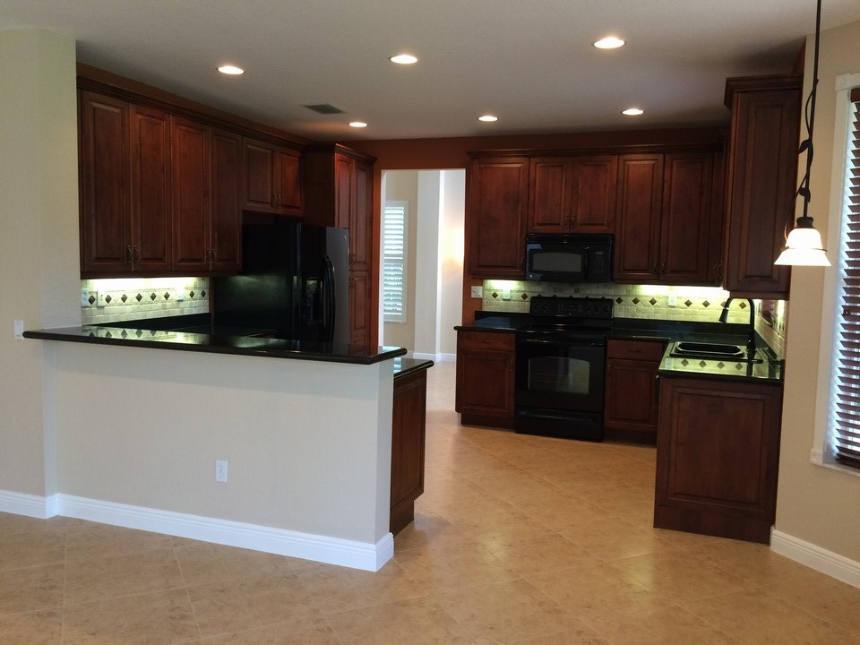 upgrade kitchen with wood cabinets, tile backsplash
