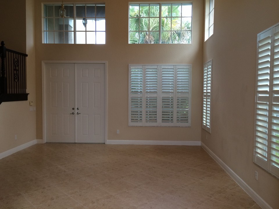 formal living room with plantation shutters
