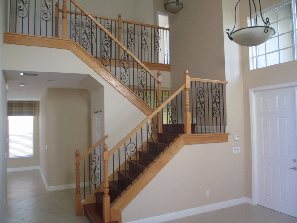 beautiful staircase with wood flooring