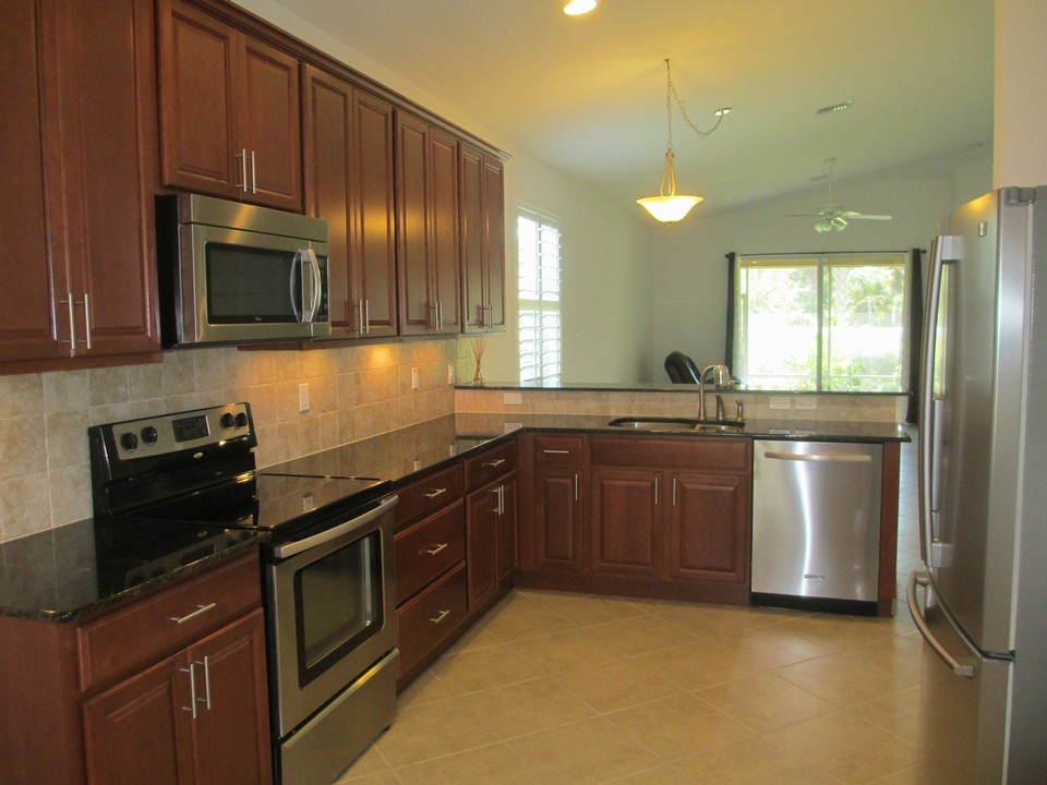 kitchen with ss appliances & granite counters