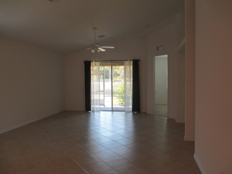 living & dining room, diagonal tile, vaulted ceilings