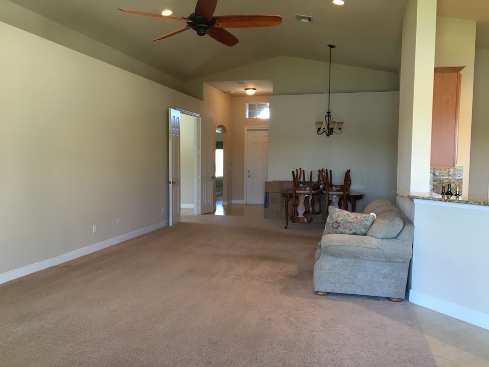 great-room, dining area, plant shelves, vaulted ceilings