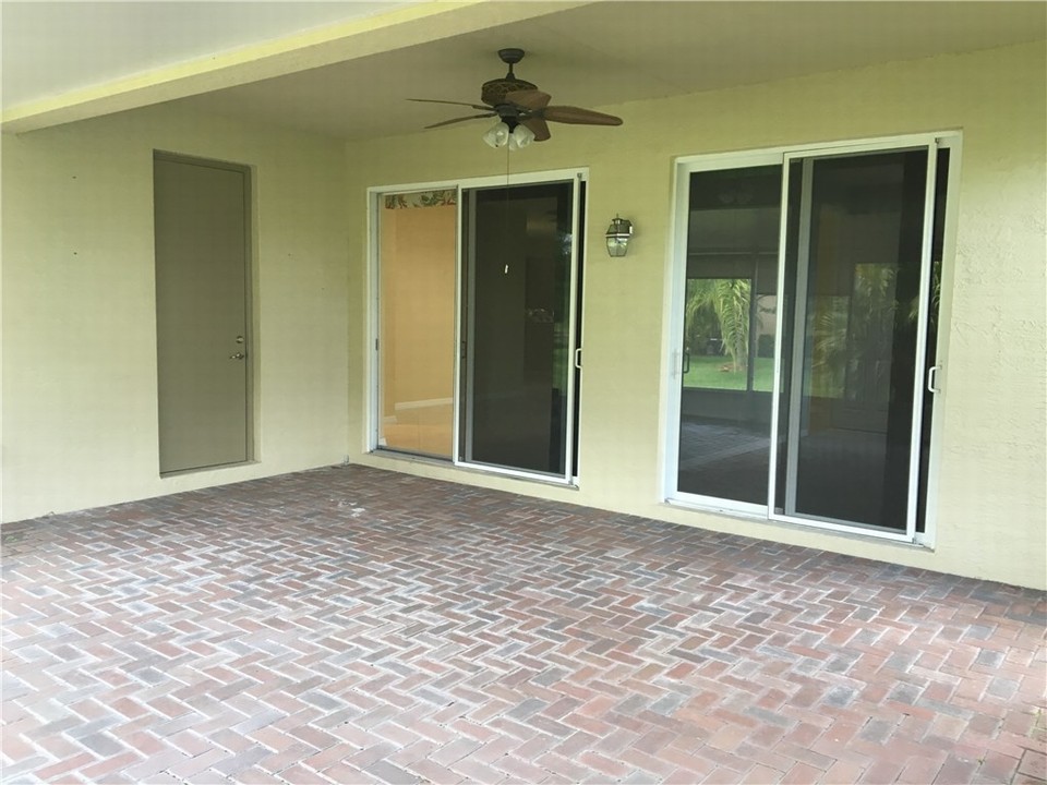 covered patio-tinted glass sliders