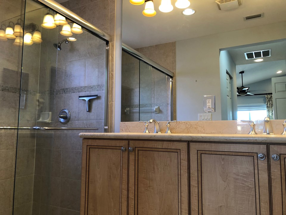 owners bath-raised counters, dual sinks, shower w/glass doors