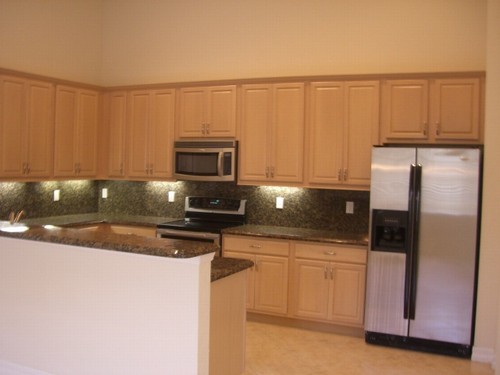 kitchen with 42 upper cabinets, stainless appliances