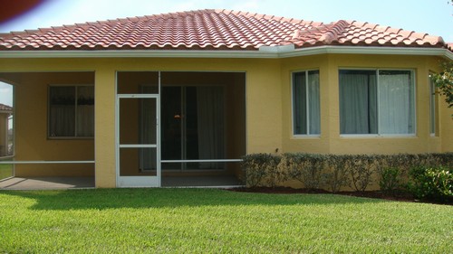 back view covered screened patio