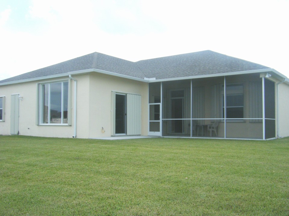 back view of house with screened covered patio