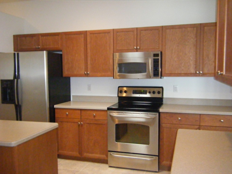stainless appliances, corian counters