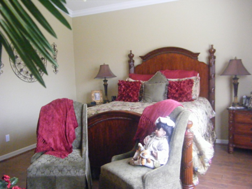 master bedroom, crown moulding and wood-like flooring