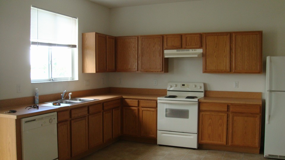 kitchen with pass-thru to dining area