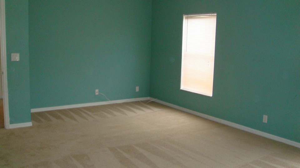 master bedroom, crown moulding and wood-like flooring