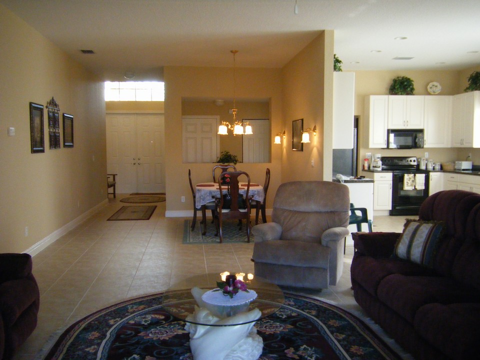 great room looking towards dining area and foyer entrance